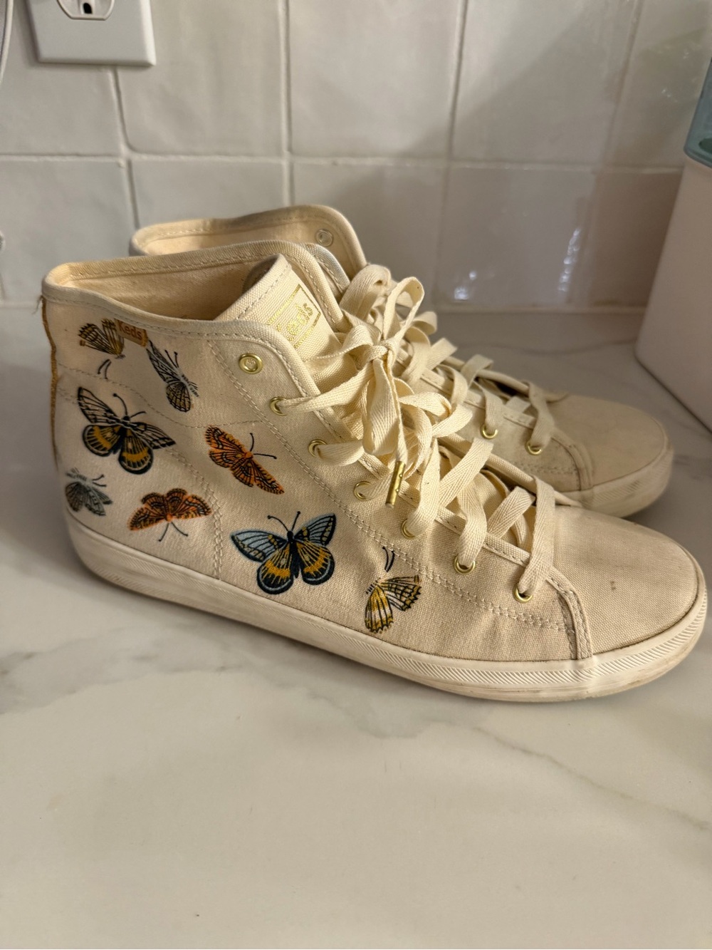 Keds Cream High-Top Canvas Sneakers with Multicolor Butterfly Motif
